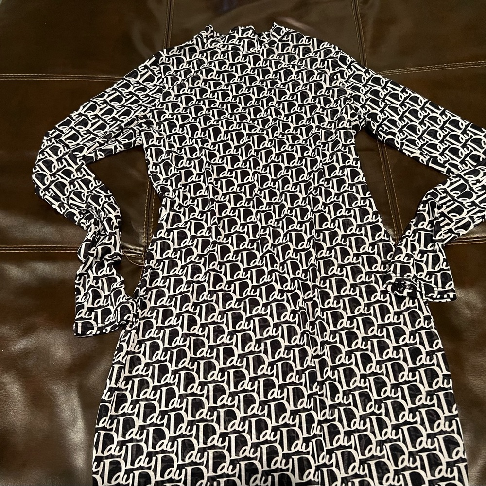 Baddieville Sheer Backless Dress